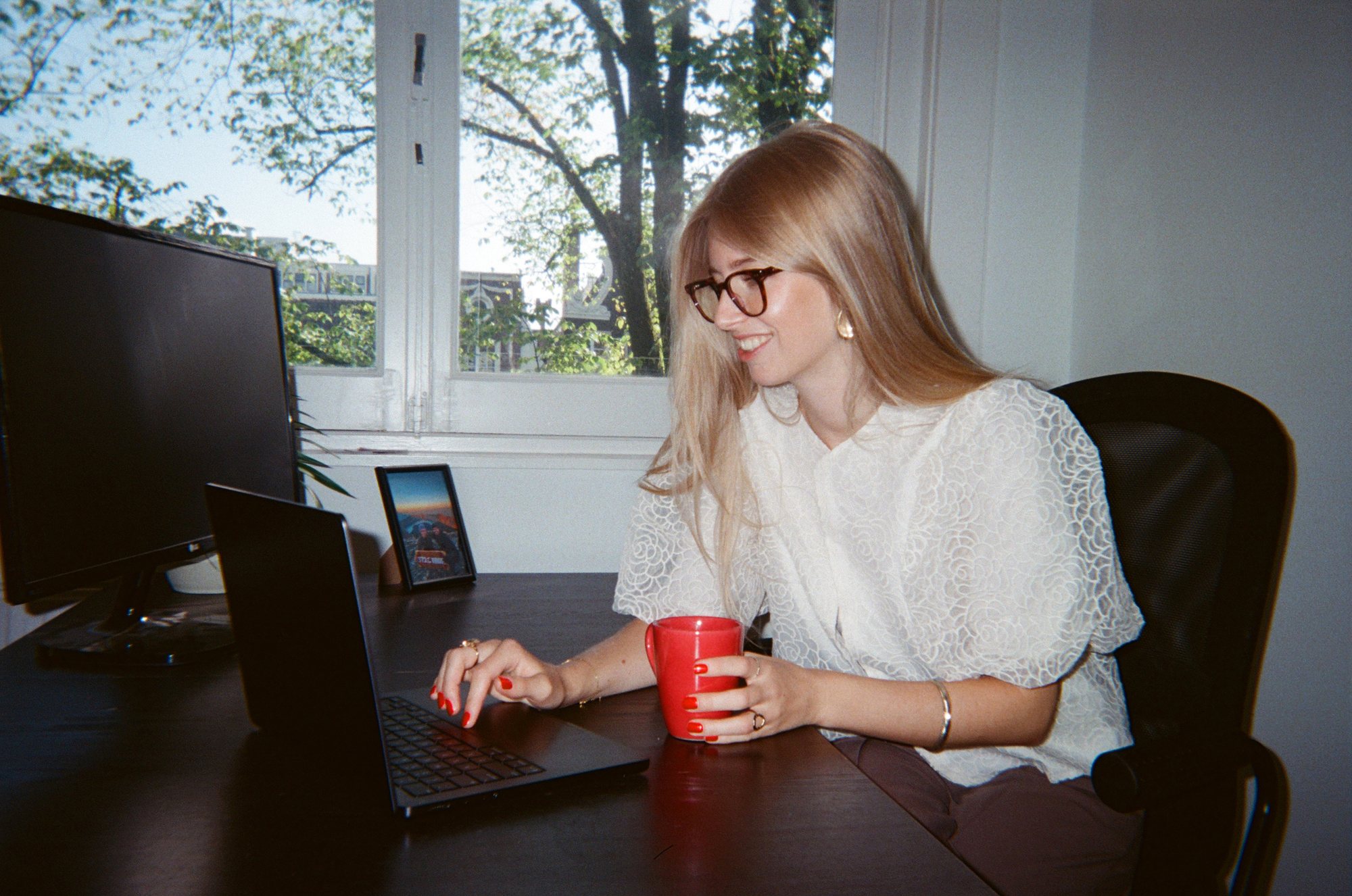 Colleague working calmly at her laptop