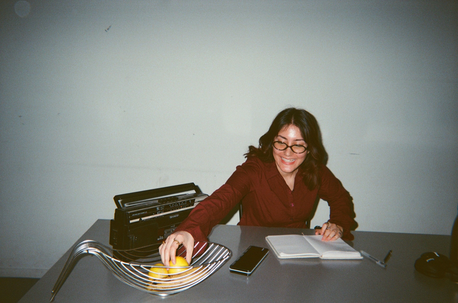 Colleague writing at a table