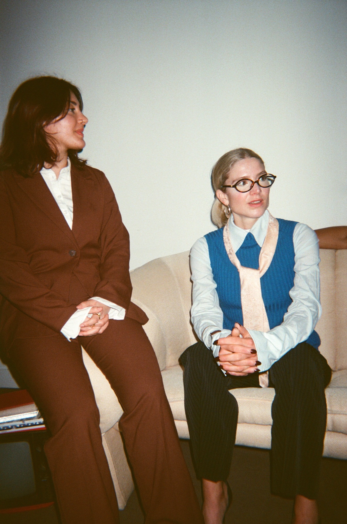 Two colleagues talking on the sofa